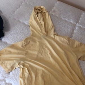 Light yellow hooded shirt
